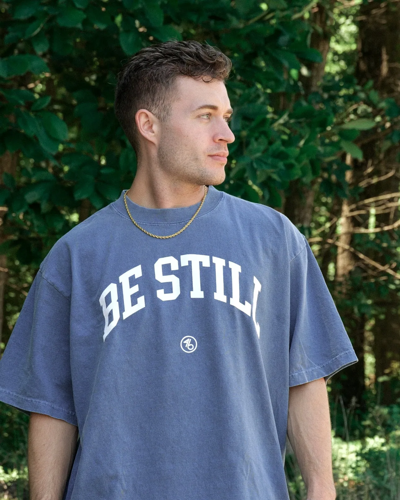 BE STILL University Style Heavy Tee