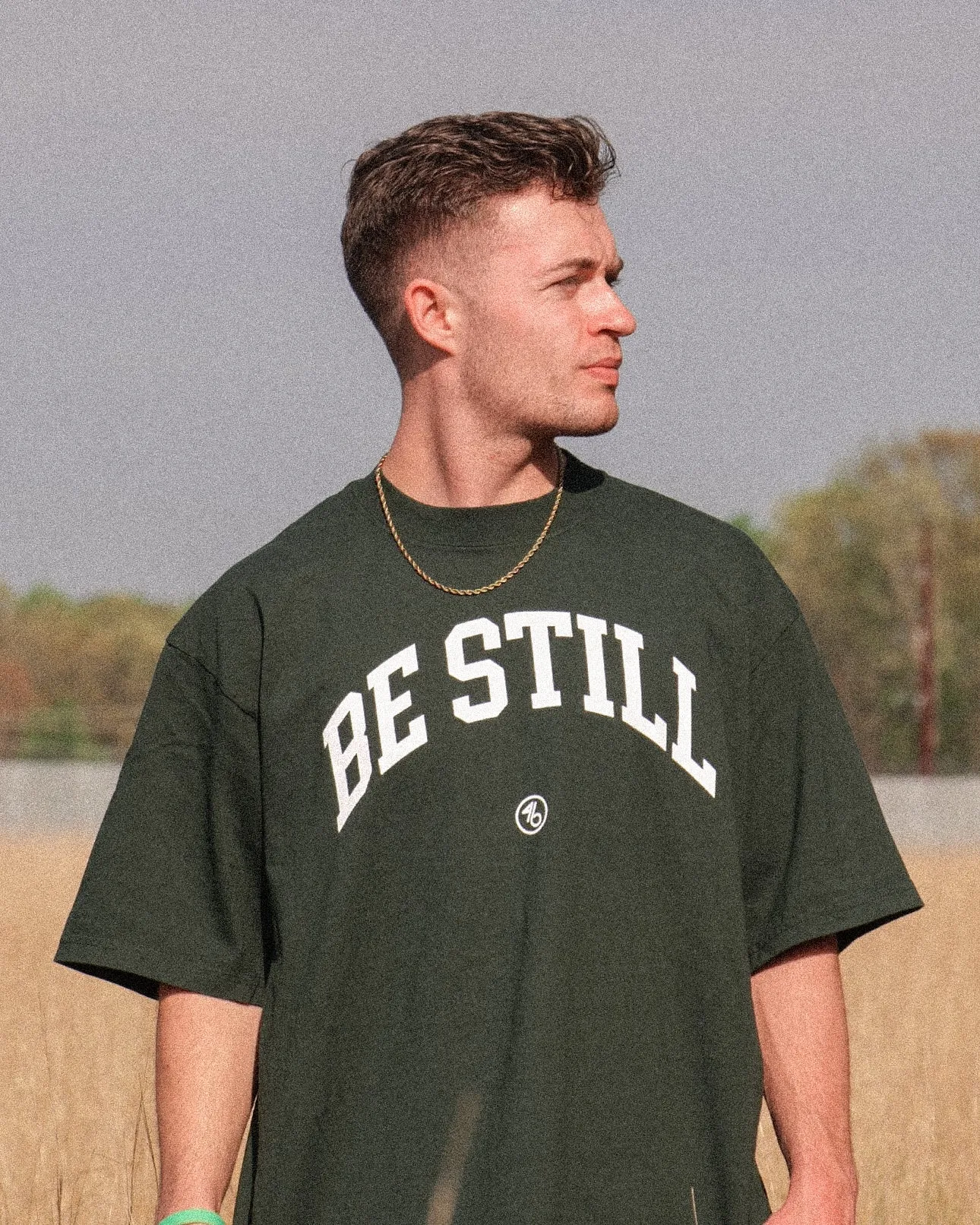 BE STILL University Style Heavy Tee