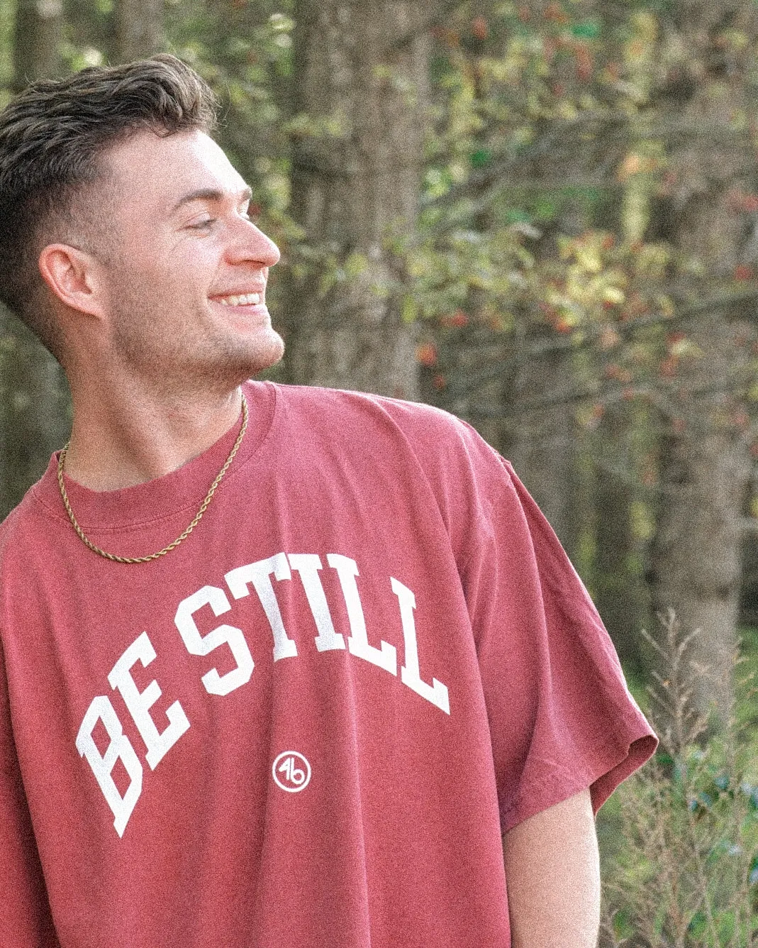 BE STILL University Style Heavy Tee