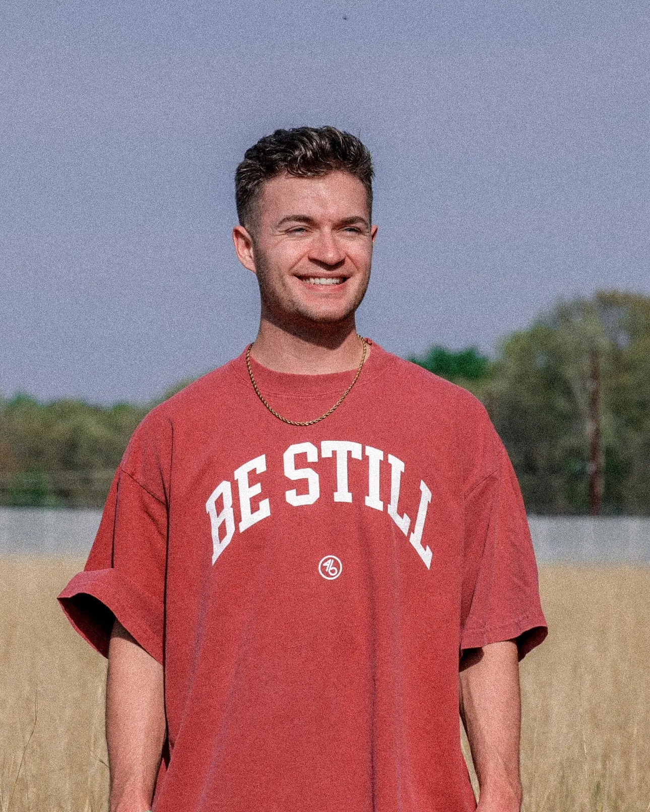 BE STILL University Style Heavy Tee