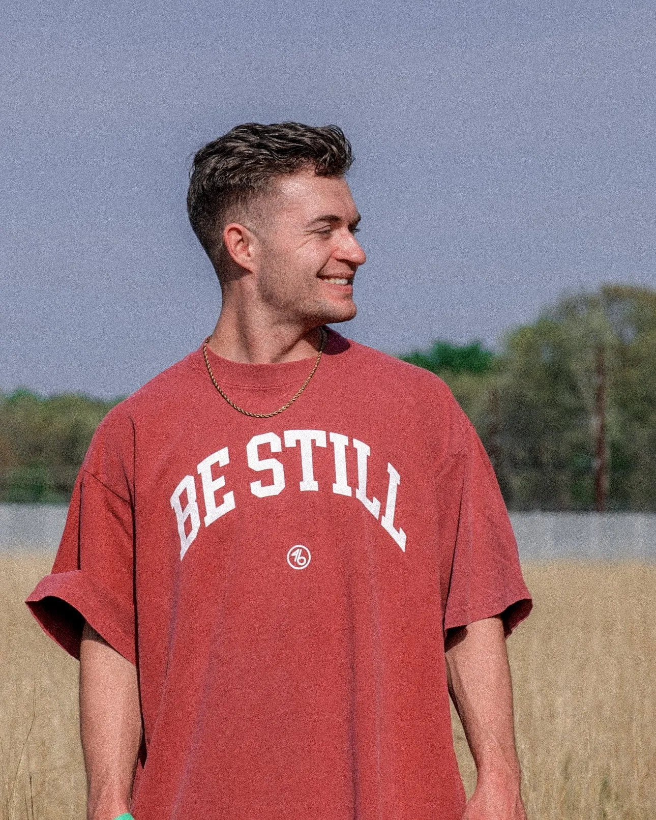 BE STILL University Style Heavy Tee