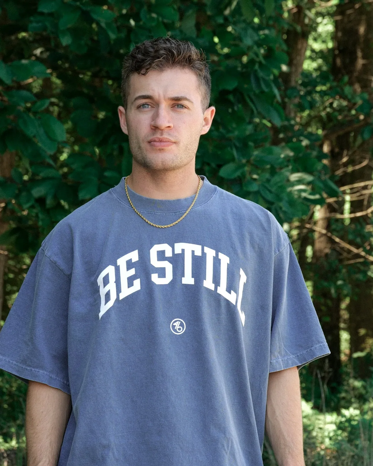 BE STILL University Style Heavy Tee