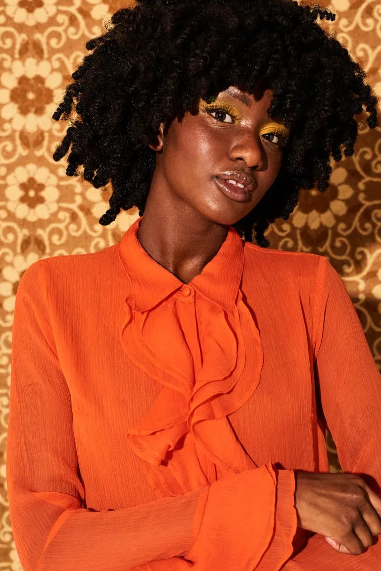 Let The Good Times Roll Orange Ruffle Blouse