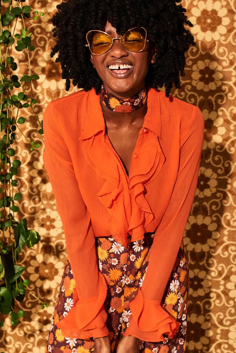 Let The Good Times Roll Orange Ruffle Blouse