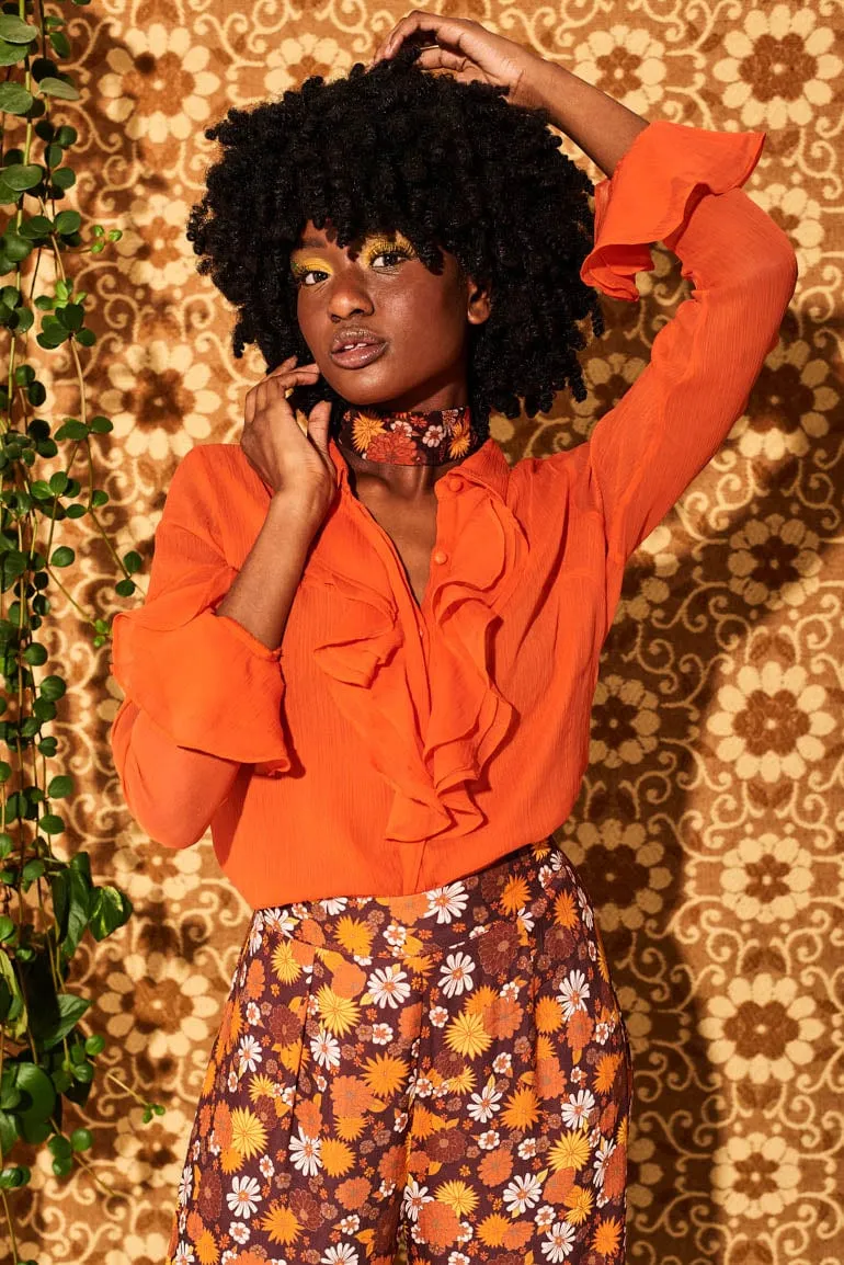 Let The Good Times Roll Orange Ruffle Blouse